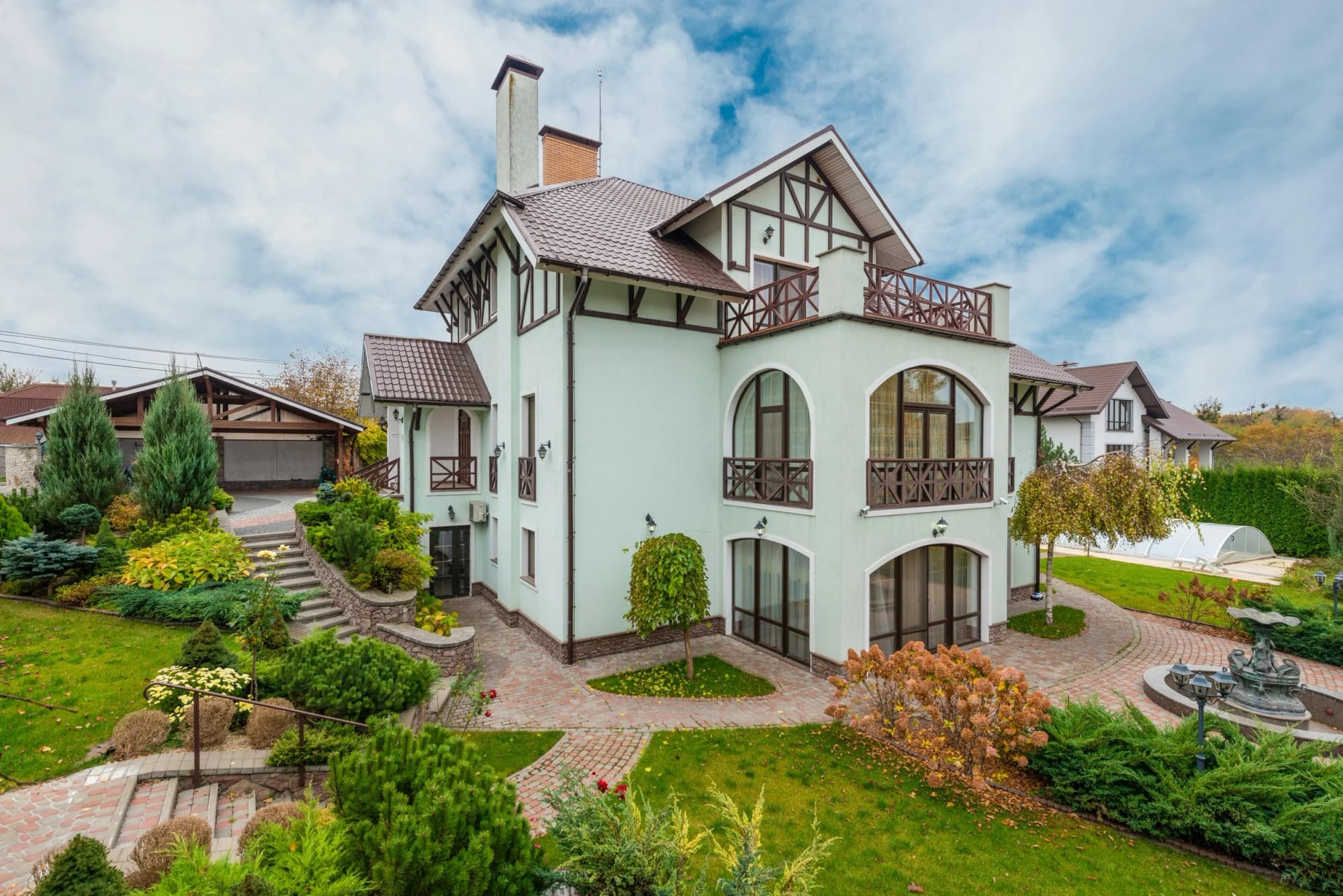 Completed custom residence with landscaped grounds